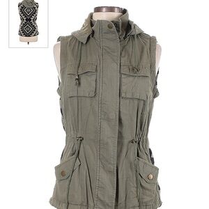 Cute utility vest, back stitched design. Size small.